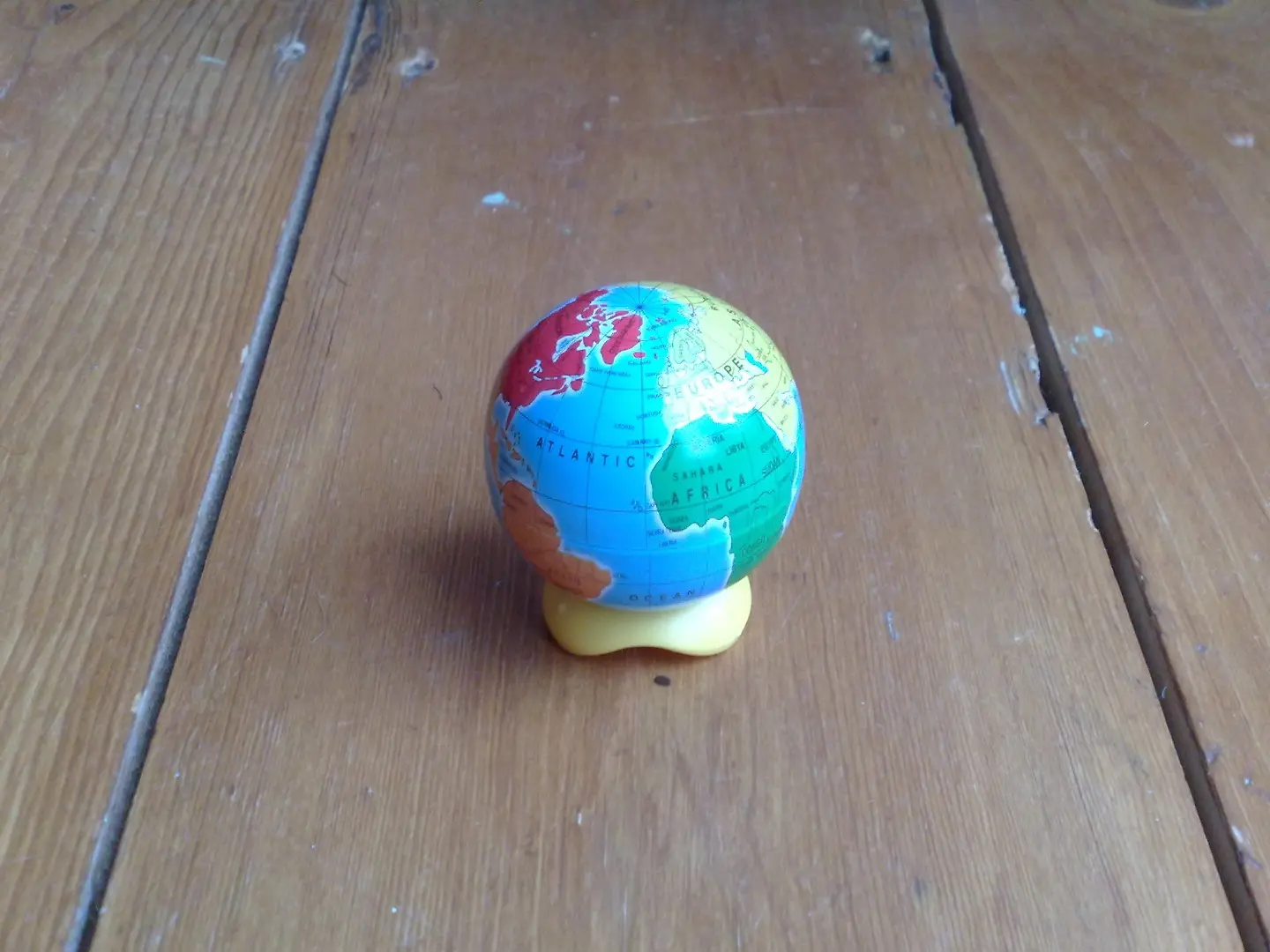 A miniature globe of the Earth.
