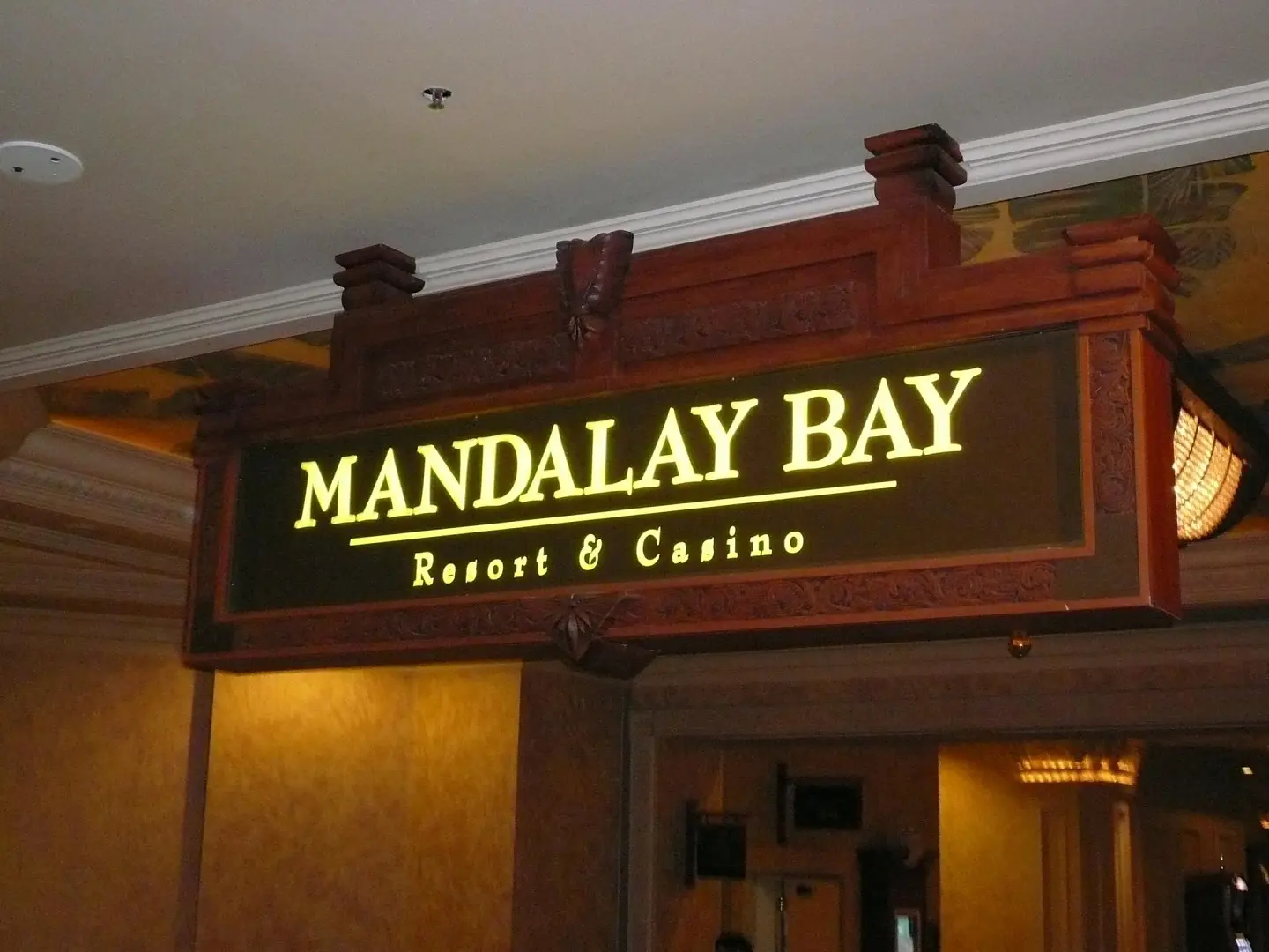An entrance sign with the words "Mandalay Bay: Resort & Casino".