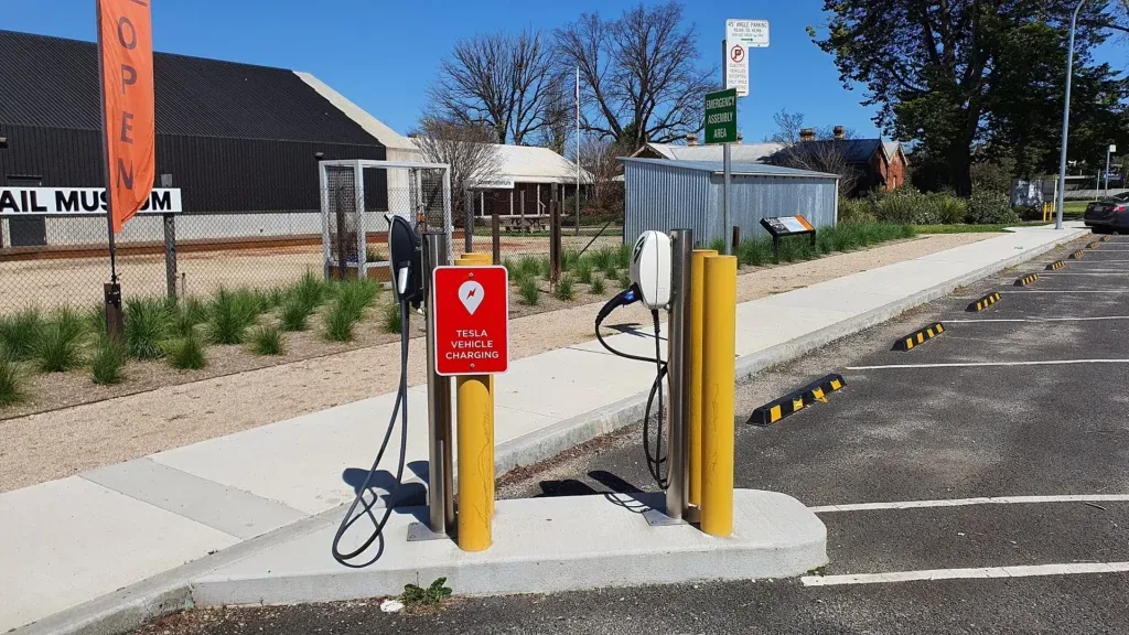 A pair of Tesla vehicle EV charging stations.