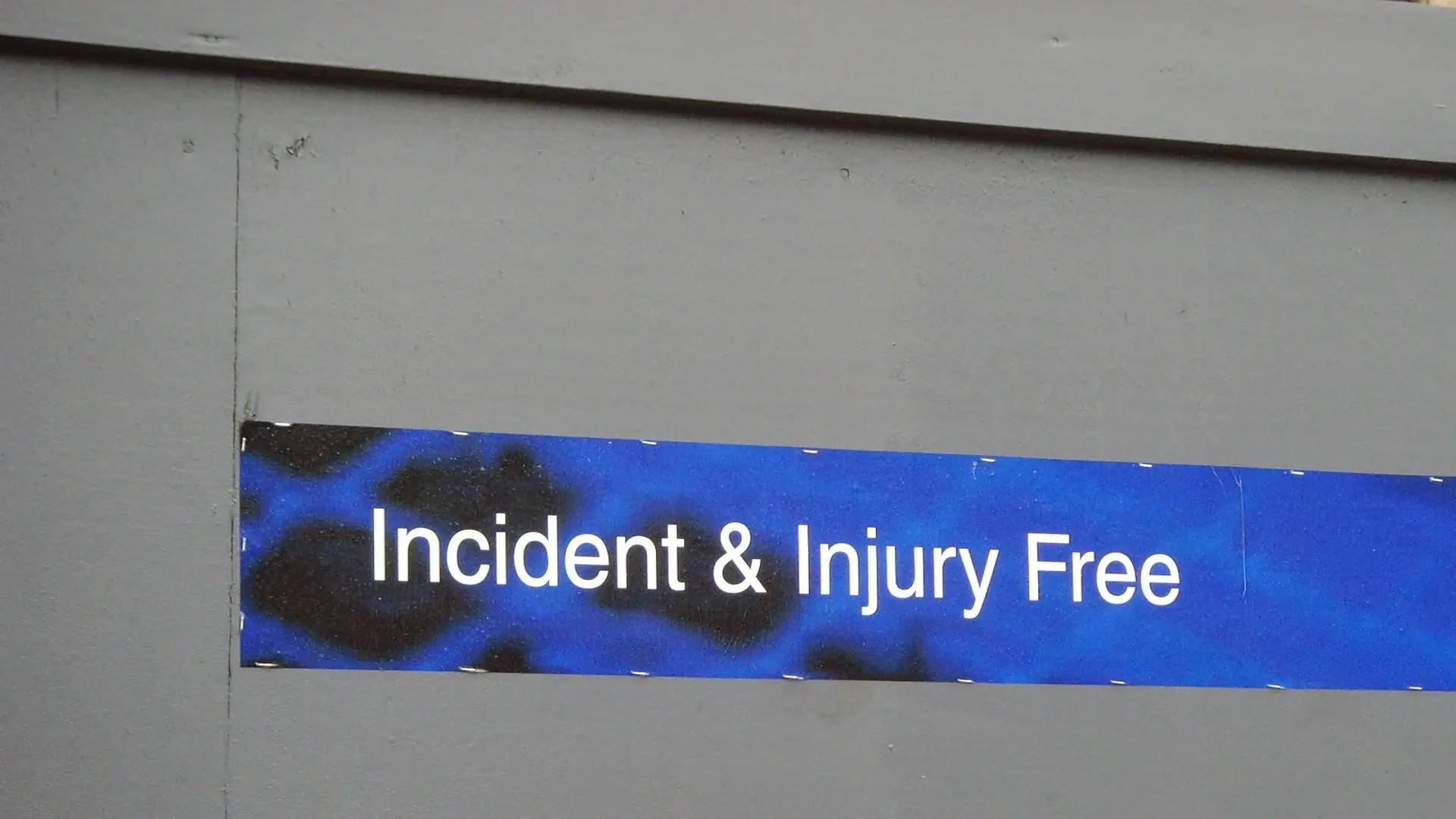 Premier a sign saying "incident & injury free" Booth Exhibits solution