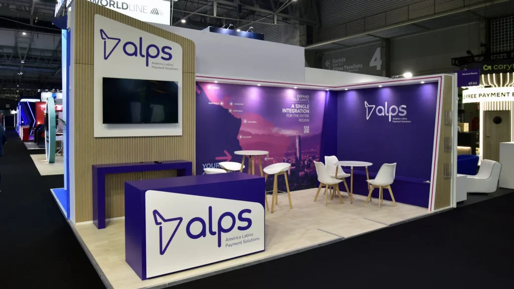 Corner exhibition stand for America Latina Payment Solutions at ICE Barcelona 2025, built by Booth Exhibits™.