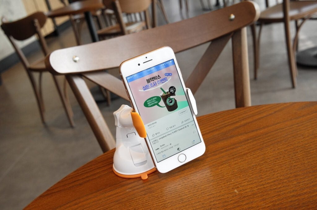 A phone on a stand.
