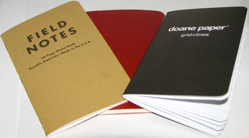 Three paperback notebook designs.