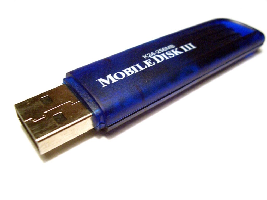 A blue USB flash drive.