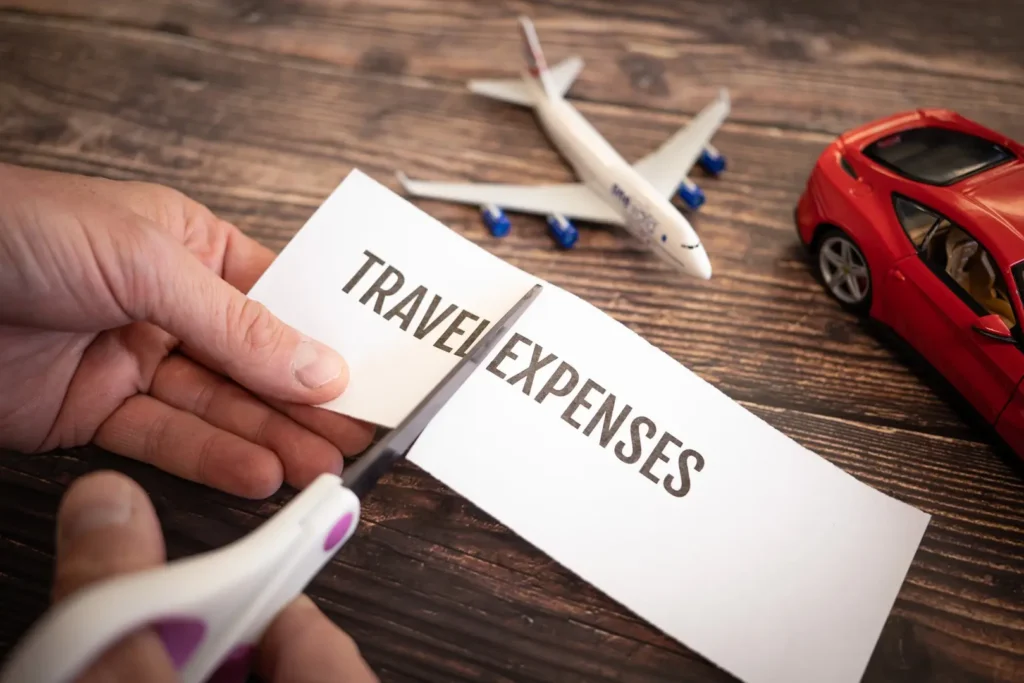Cutting travel expenses with scissors