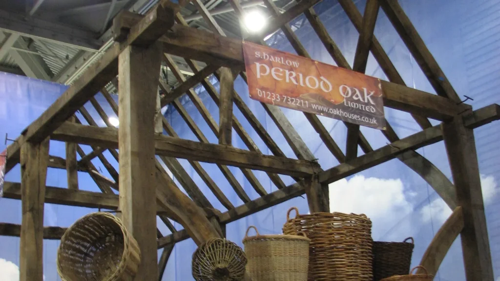 Rustic wooden structure with baskets seen at Grand Designs Live.