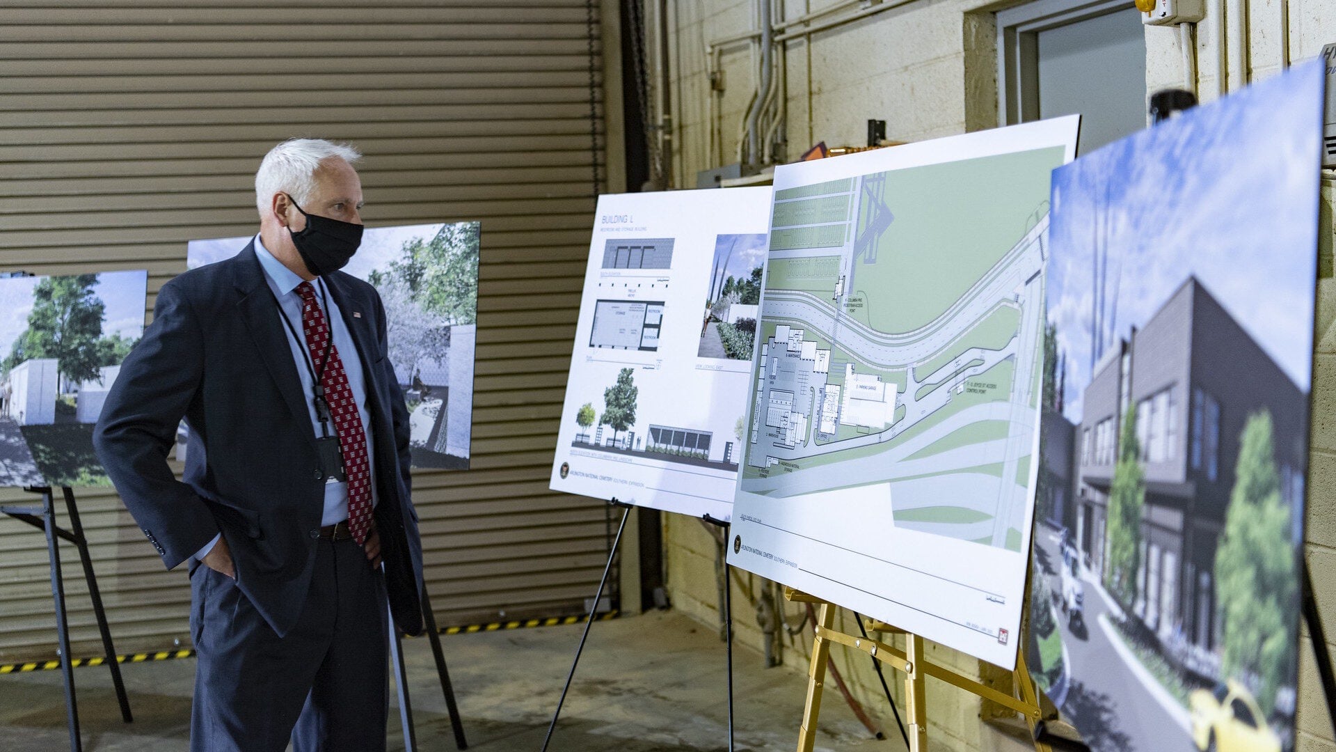 Man reviewing architectural design plans.