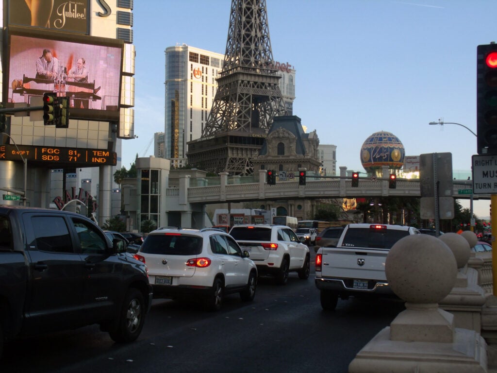 Cars stopped at a stoplight in downtown Las Vegas.