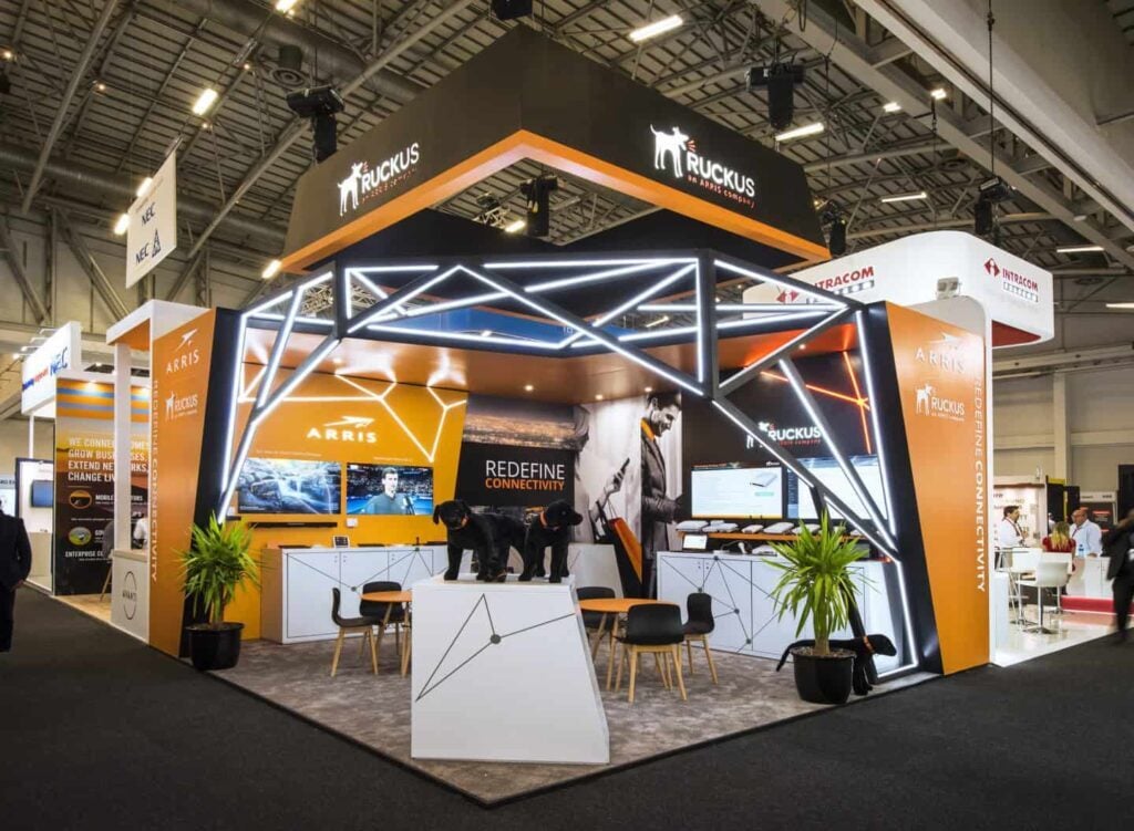 Custom exhibition stand design with illuminated frame at a UK trade show