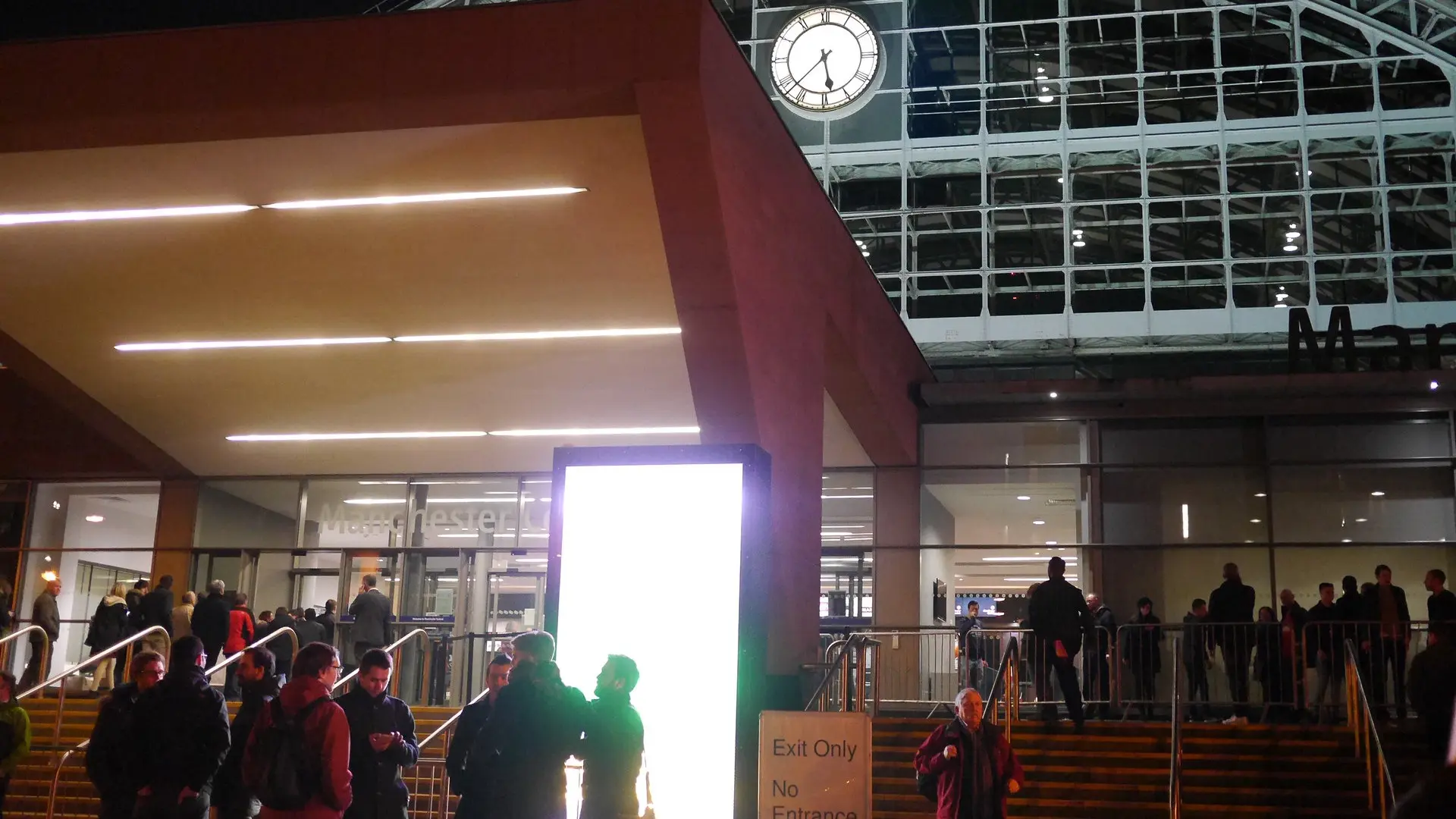 Entrance to Manchester Central Exhibition Centre with guests crowding around. 